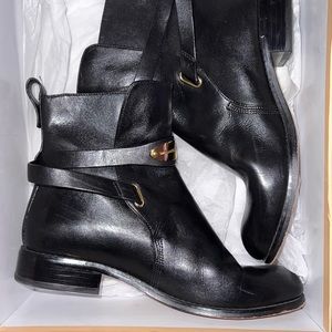 61/2 black mocha Kors boot with gold buckle small heel
